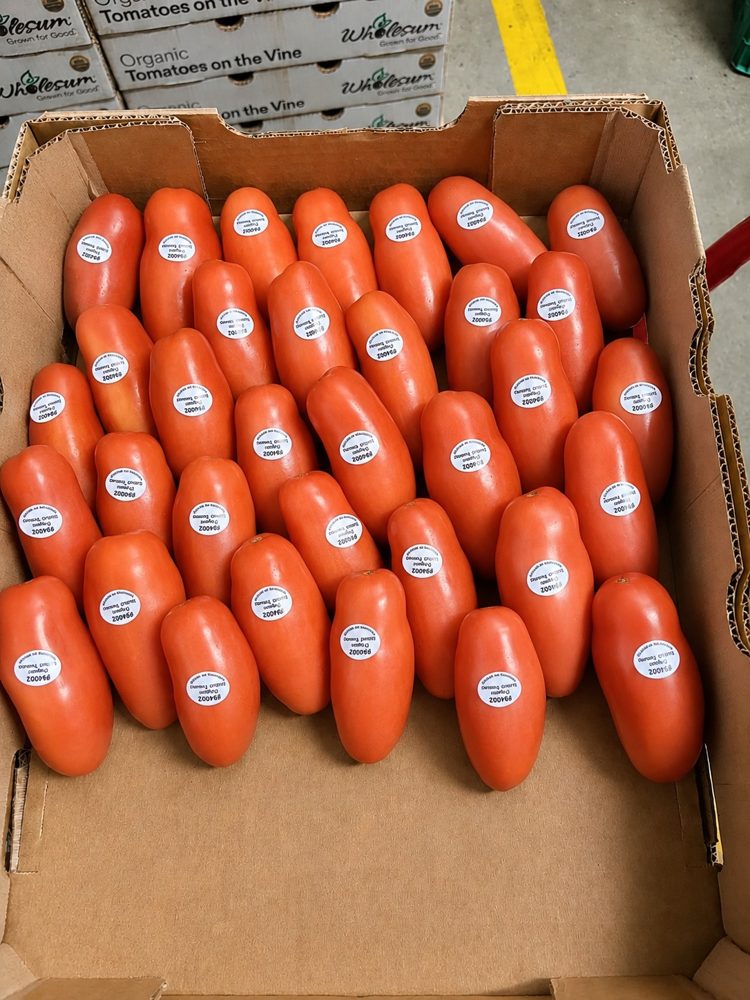 Case of stickered organic San Marzano tomatoes